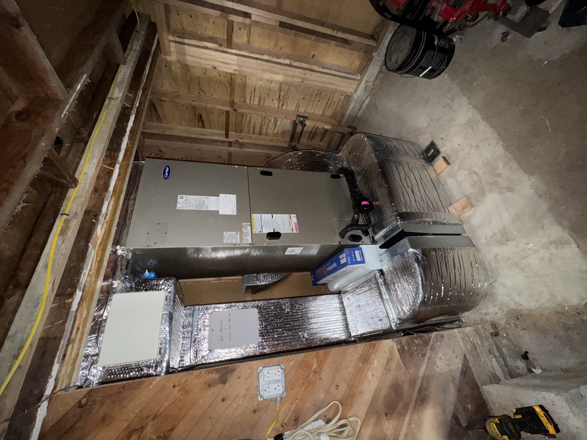 Technician repairing an AC unit